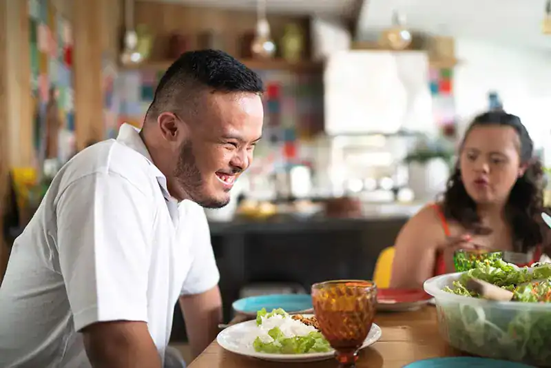 Empowering Weight Loss: A Comprehensive Guide for Individuals with Disabilities 2 Image of a disabled man and balance around nutrition to aid weight loss Dorset