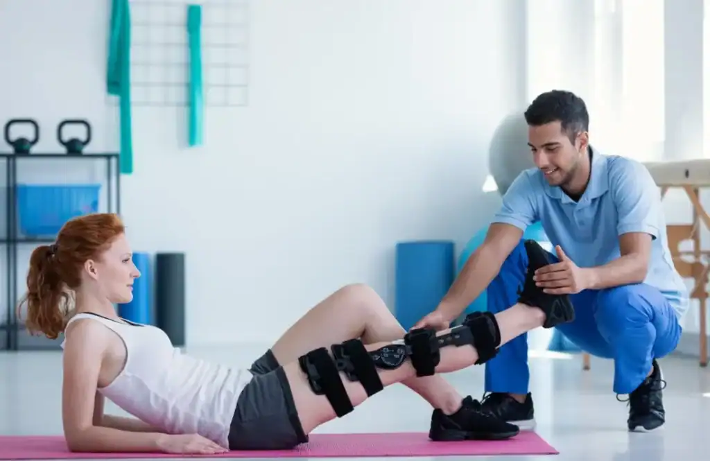 Debunking Meal Timing Myths: The Truth About Muscle Recovery 1 Woman having treatment to help muscle recovery Dorset after an injury