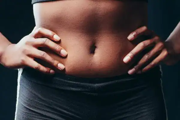 Toning Your Stomach: The Ultimate Guide to Achieving a Sculpted Stomach While Shedding Pounds 1 Image of a toned stomach after non surgical treatment Dorset